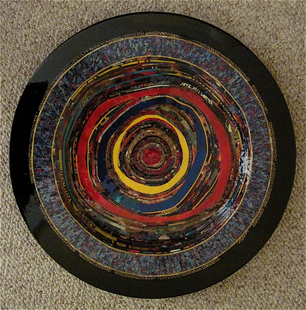 Exultate Jubilate. Mosaic paper collage on wooden disc, finished with multiple coats polyurethane varnish. Hanger fixed on back. 13" diameter. $325.00.